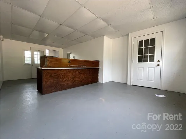 a room with furniture and window