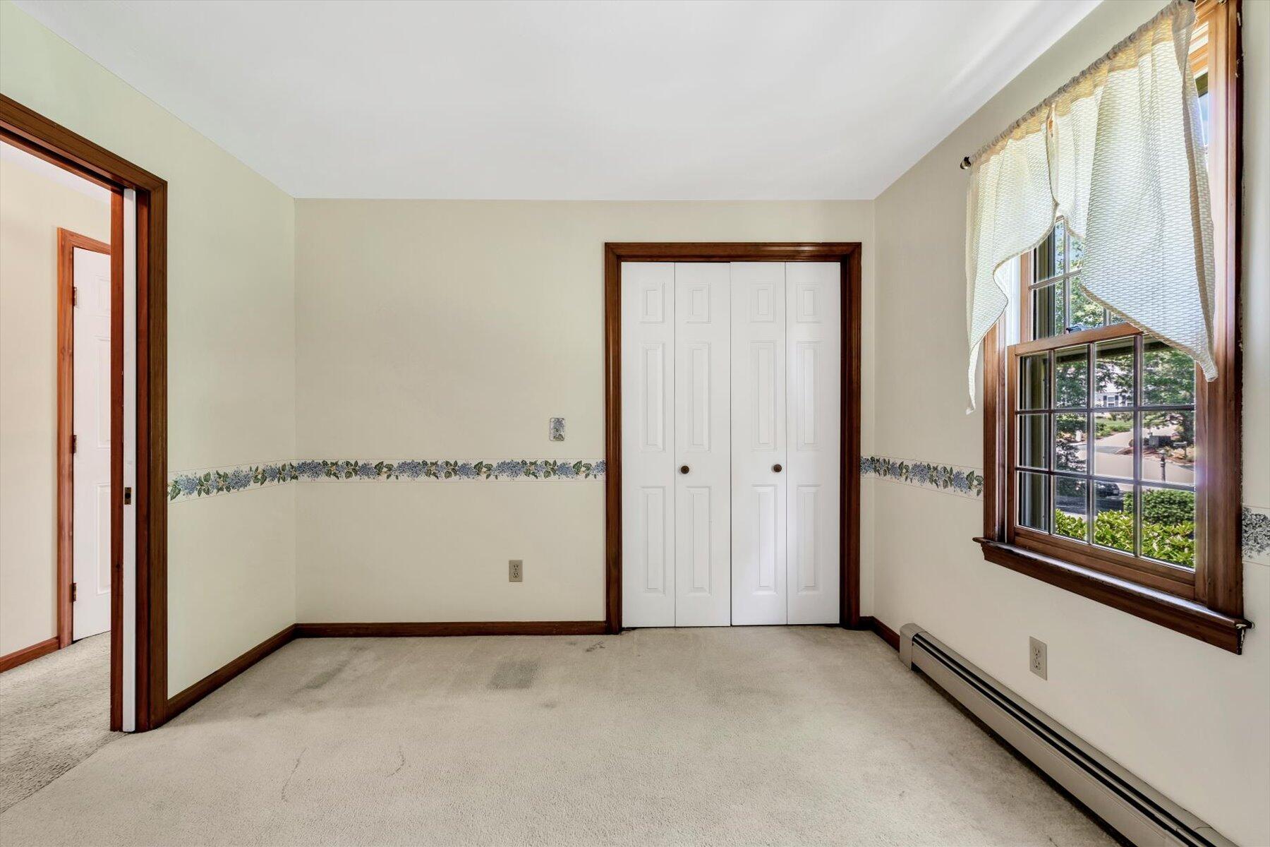 18 Pheasant Run Road Harwich, MA 02645 - Photo 20 of 51 an empty room with windows