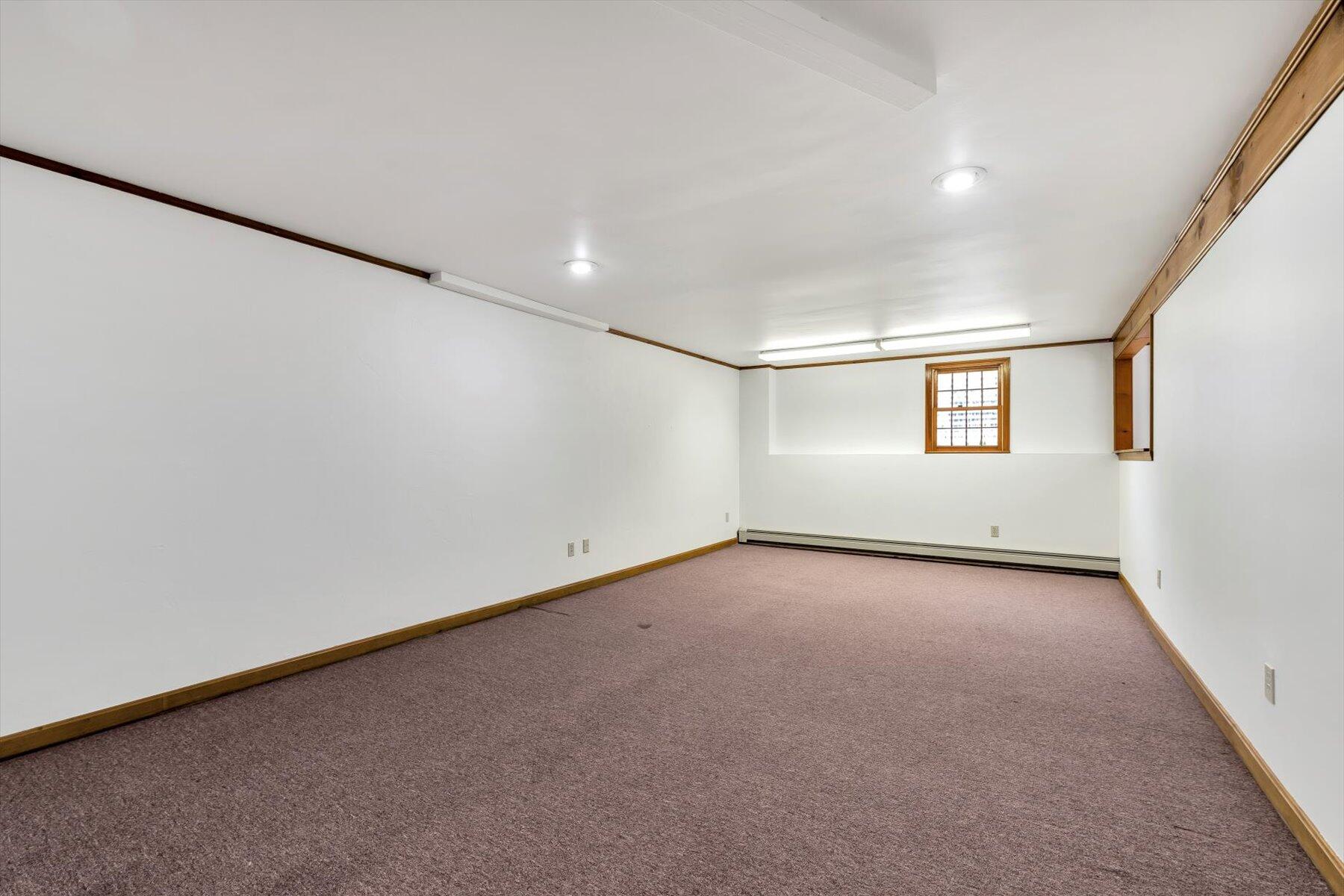 18 Pheasant Run Road Harwich, MA 02645 - Photo 33 of 51 an empty room with windows