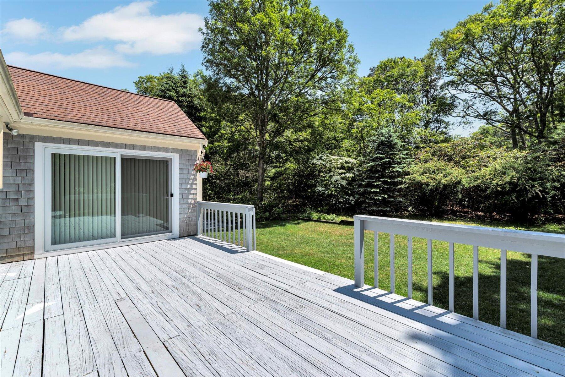 18 Pheasant Run Road Harwich, MA 02645 - Photo 39 of 51 a view of a house with a deck