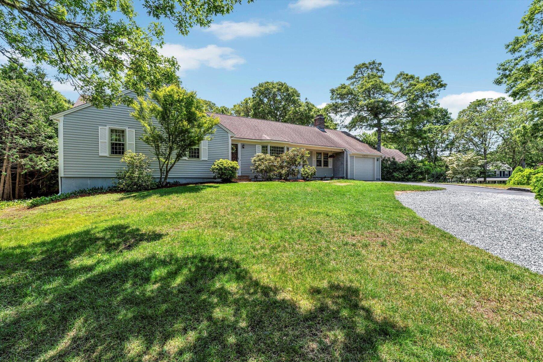 18 Pheasant Run Road Harwich, MA 02645 - Photo 47 of 51 a view of a house with a yard