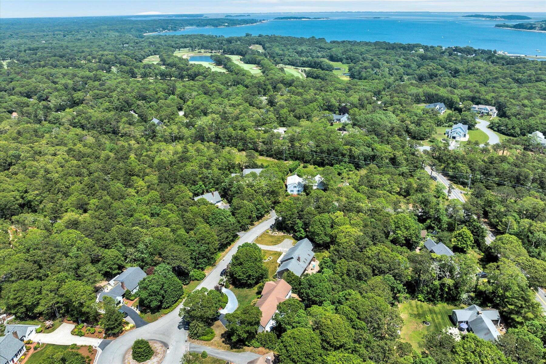 18 Pheasant Run Road Harwich, MA 02645 - Photo 49 of 51 an aerial view of a house with a yard