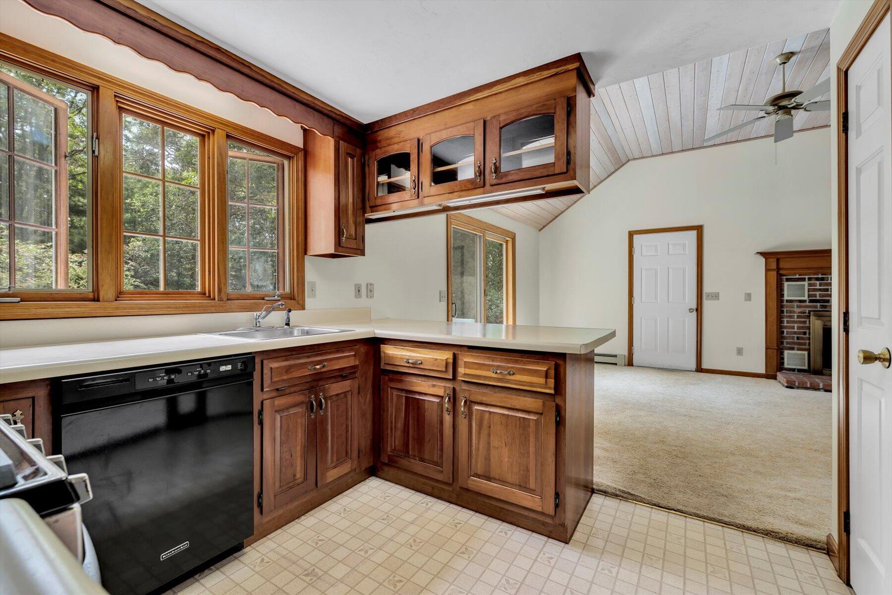 18 Pheasant Run Road Harwich, MA 02645 - Photo 7 of 51 a kitchen with a sink cabinets and window