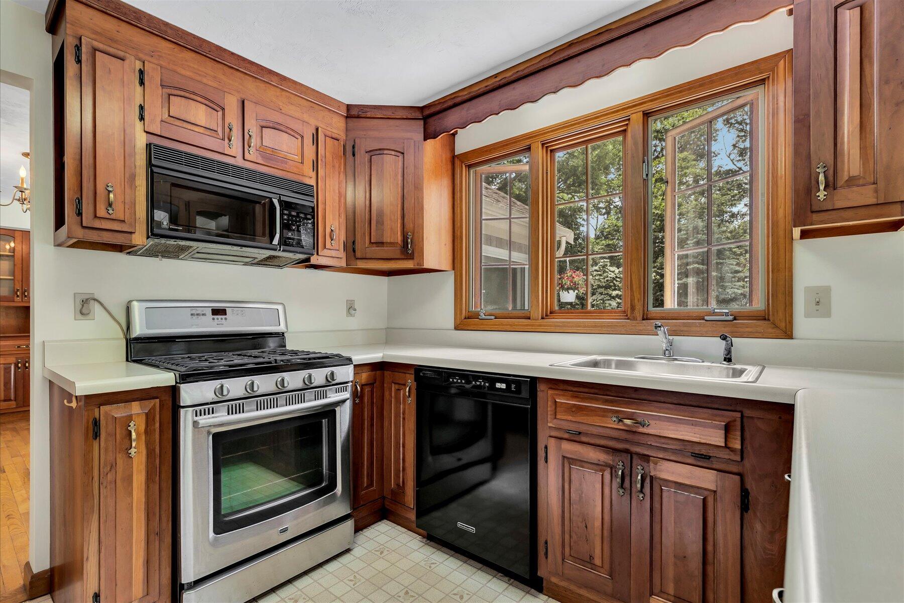 18 Pheasant Run Road Harwich, MA 02645 - Photo 8 of 51 a kitchen with stainless steel appliances granite countertop a stove sink and cabinets