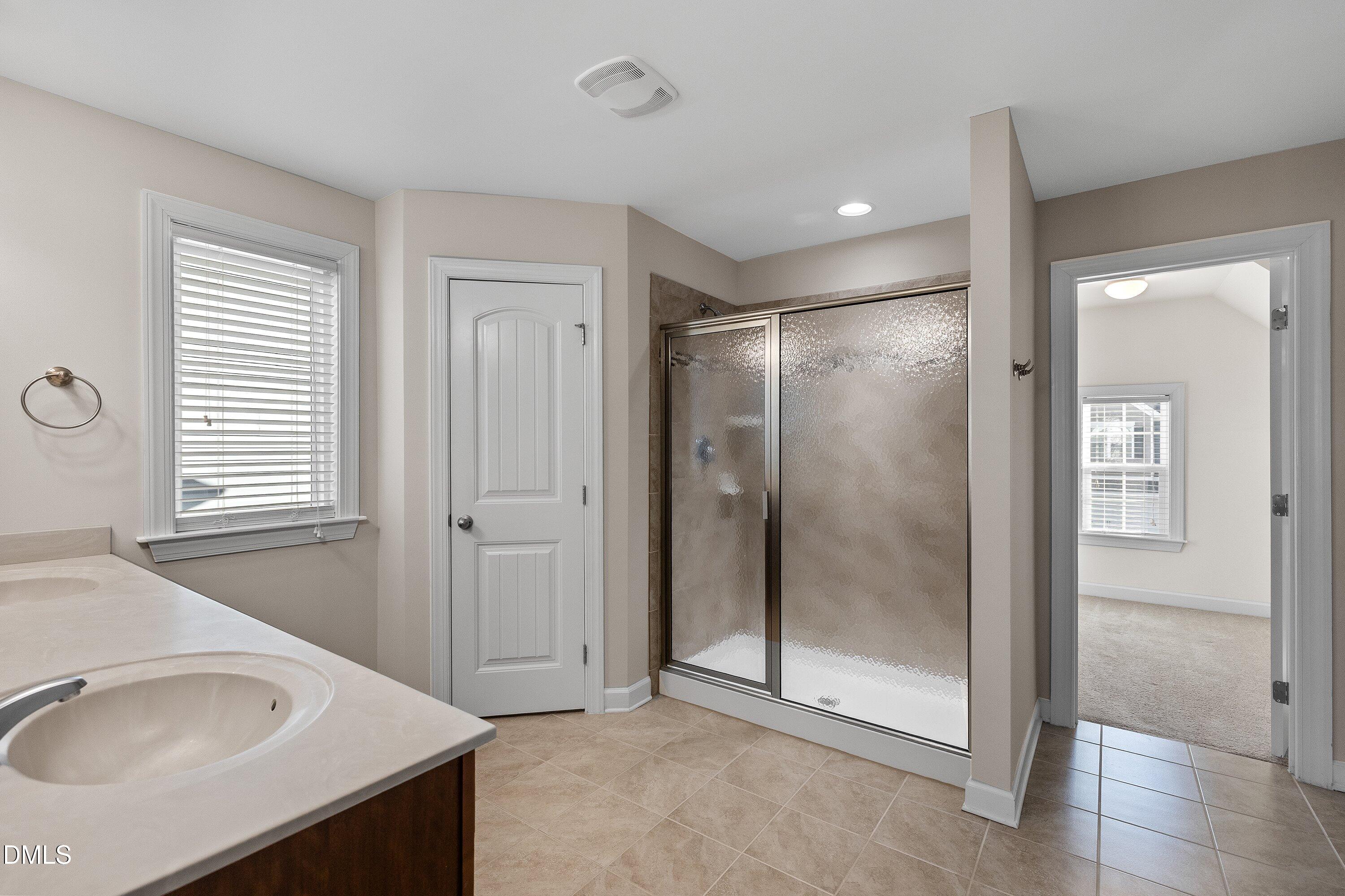 721 Maple Brook Road Fuquay-Varina, NC 27526 - Photo 31 of 59 Owners Spa has large walk in shower, water closet and dual sinks!