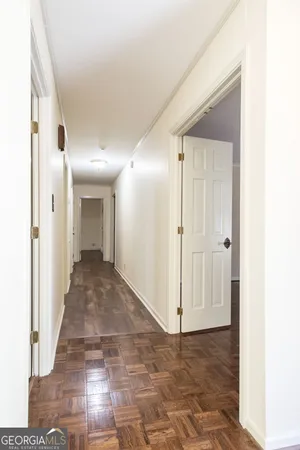 a room that has a table and a chair in it