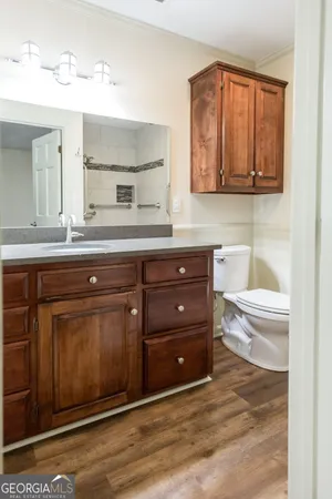 a bathroom with a shower and a sink