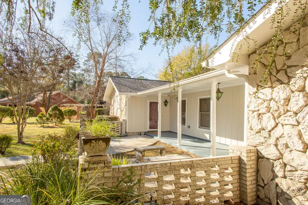 a view of a swimming pool with an outdoor space