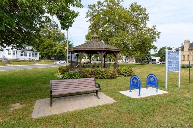 a garden view with a seating space