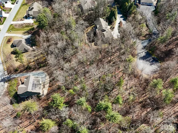 an aerial view of residential house with parking space