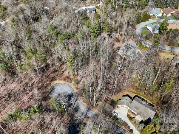 an aerial view of residential house with parking space