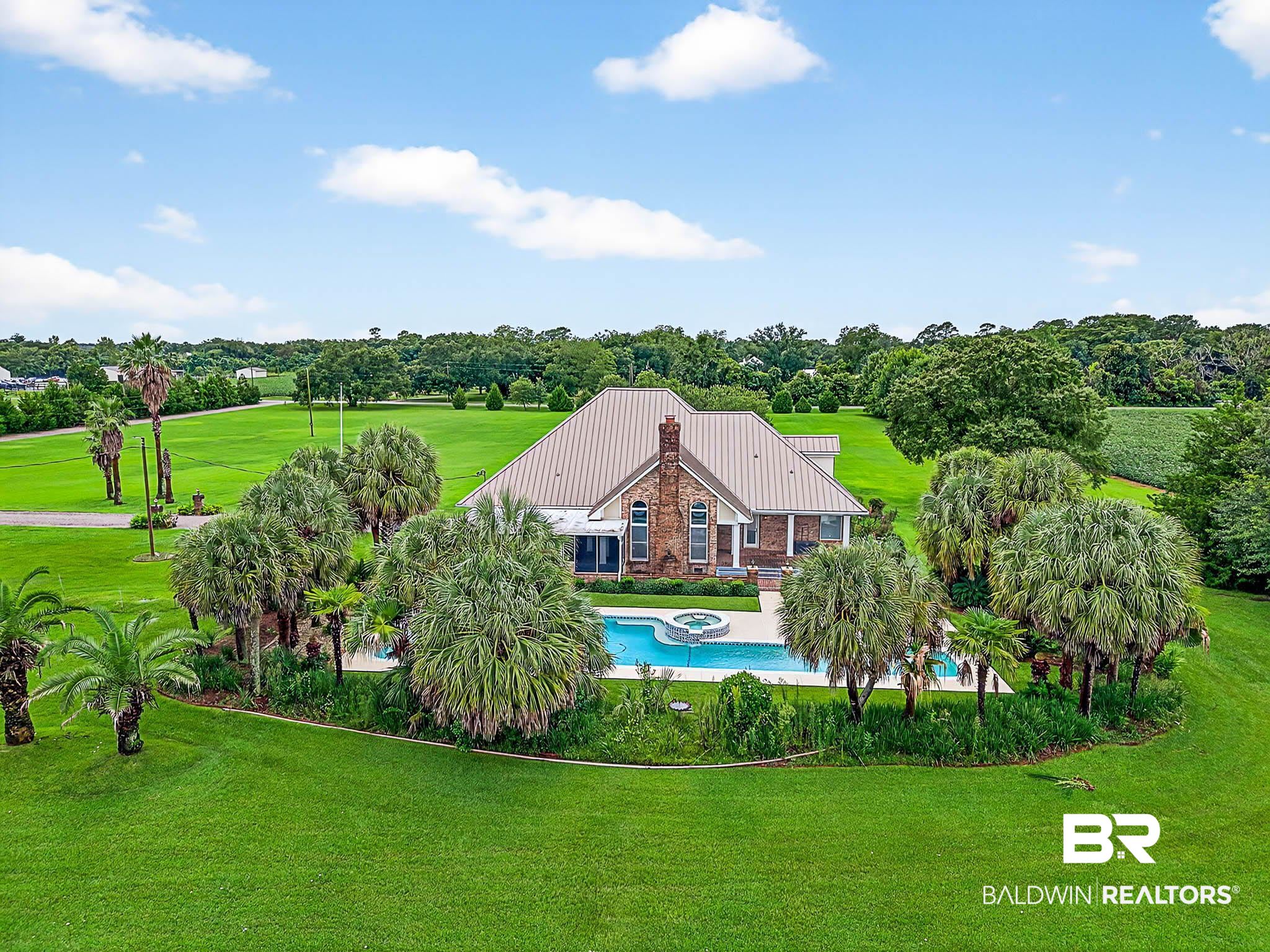 17270 Davis Road Summerdale, AL 36580 - Photo 59 of 97 Aerial view of property and surrounding area with a pool