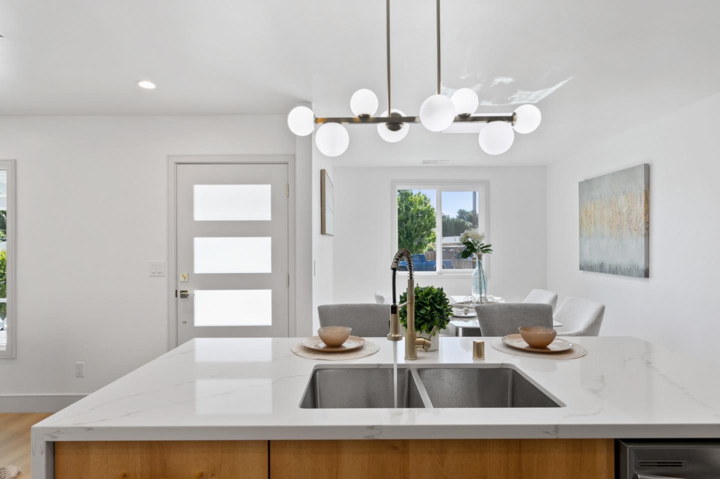 1381 Hampton Drive Sunnyvale, CA 94087 - Photo 12 of 28 a view of a kitchen with a sink and chandelier