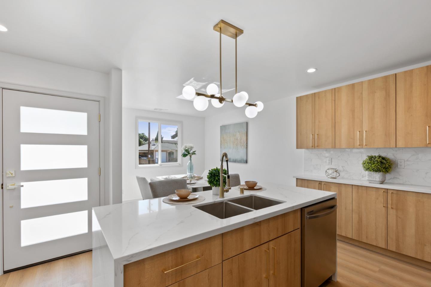 1381 Hampton Drive Sunnyvale, CA 94087 - Photo 13 of 28 a kitchen with a sink a counter space and cabinets