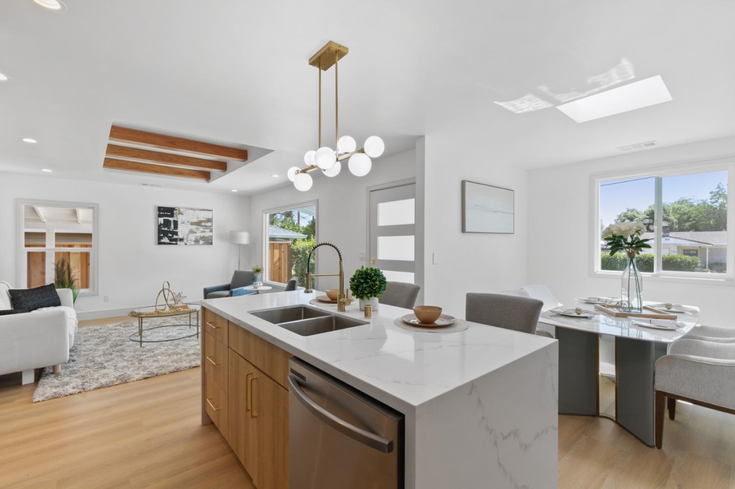 1381 Hampton Drive Sunnyvale, CA 94087 - Photo 15 of 28 a kitchen with a table chairs and white cabinets