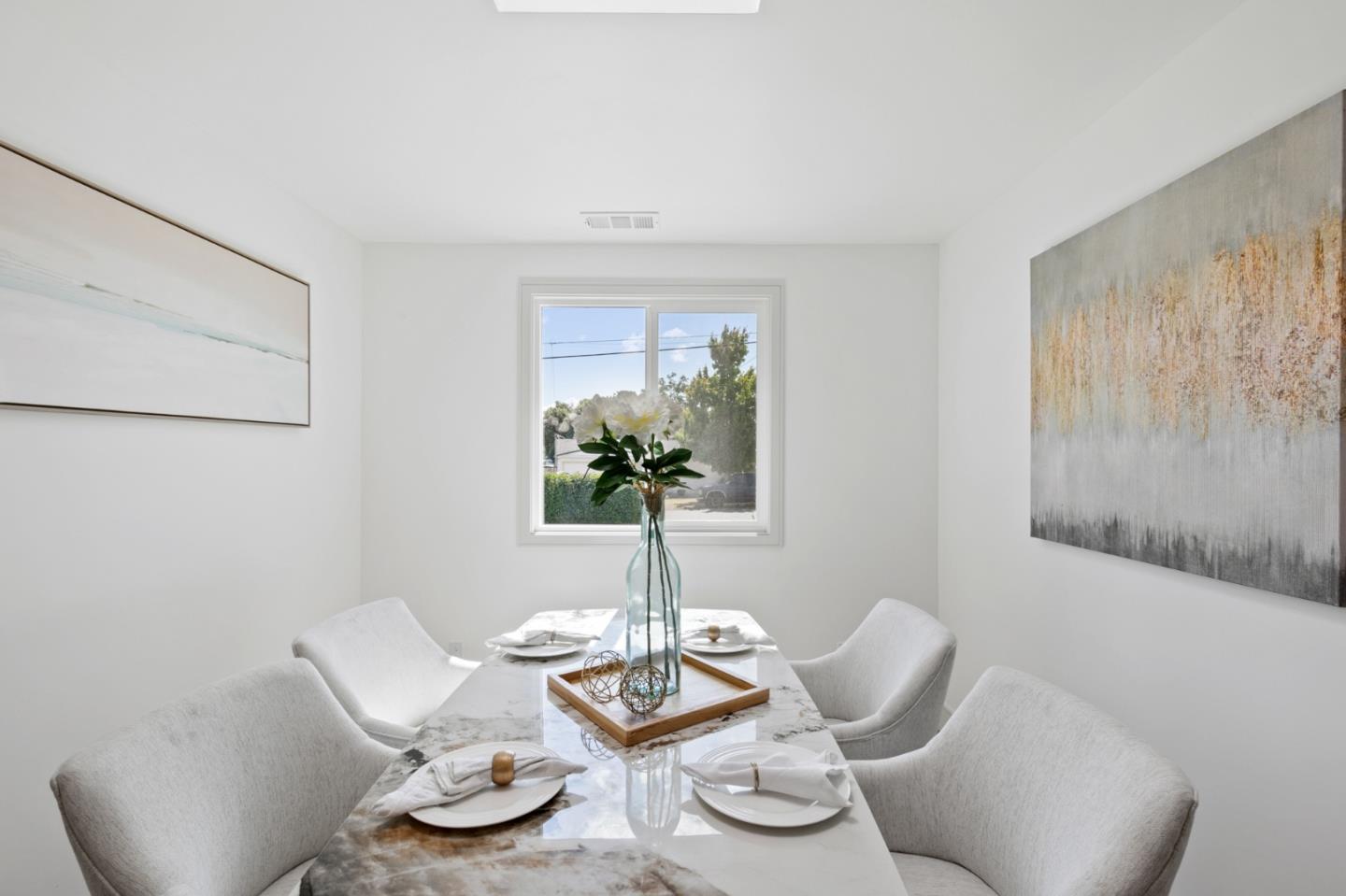 1381 Hampton Drive Sunnyvale, CA 94087 - Photo 16 of 28 a living room with furniture and a potted plant