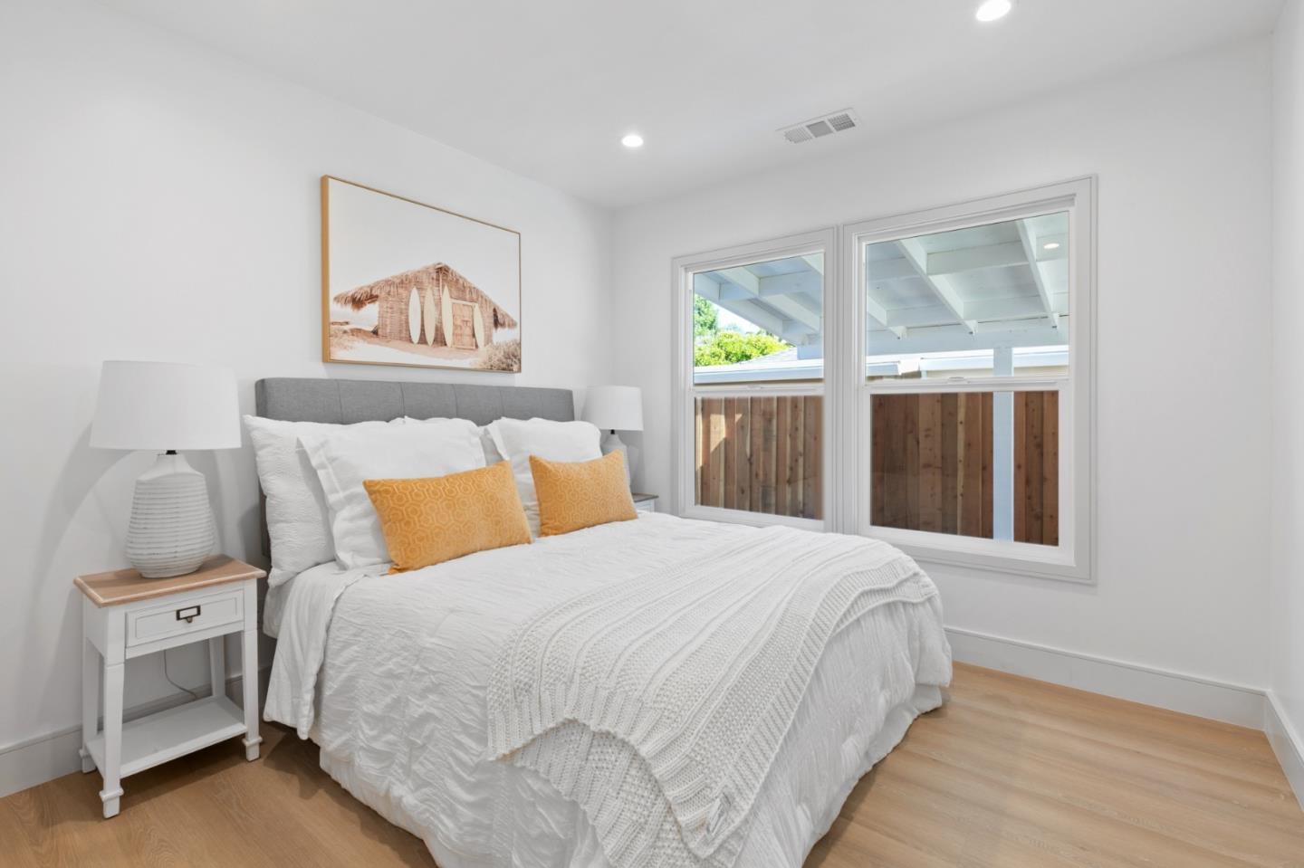 1381 Hampton Drive Sunnyvale, CA 94087 - Photo 19 of 28 a bedroom with a bed and a window