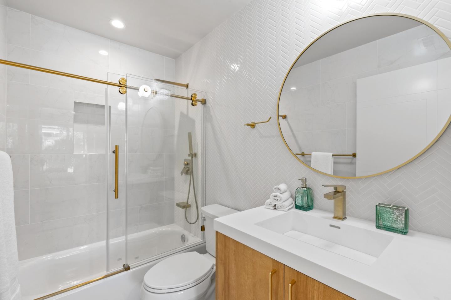 1381 Hampton Drive Sunnyvale, CA 94087 - Photo 26 of 28 a bathroom with a granite countertop sink toilet and shower