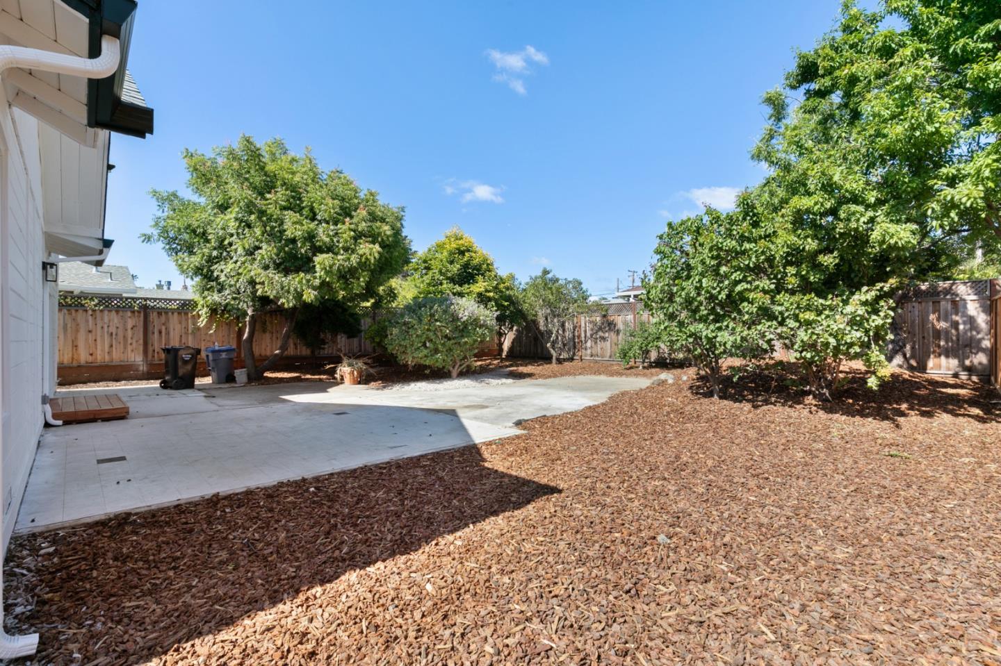 1381 Hampton Drive Sunnyvale, CA 94087 - Photo 27 of 28 a view of a street with houses on both side