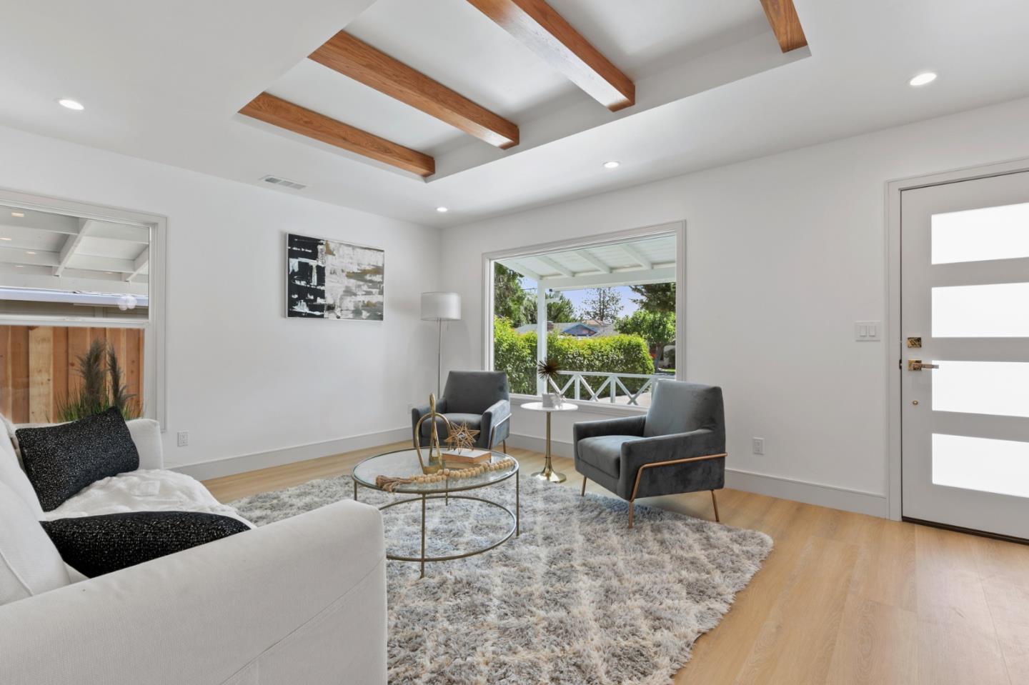 1381 Hampton Drive Sunnyvale, CA 94087 - Photo 5 of 28 a living room with furniture and a potted plant