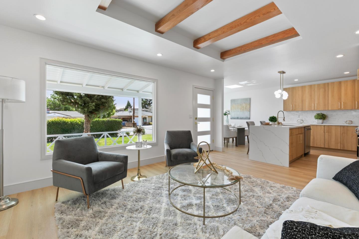 1381 Hampton Drive Sunnyvale, CA 94087 - Photo 7 of 28 a living room with furniture and a large window