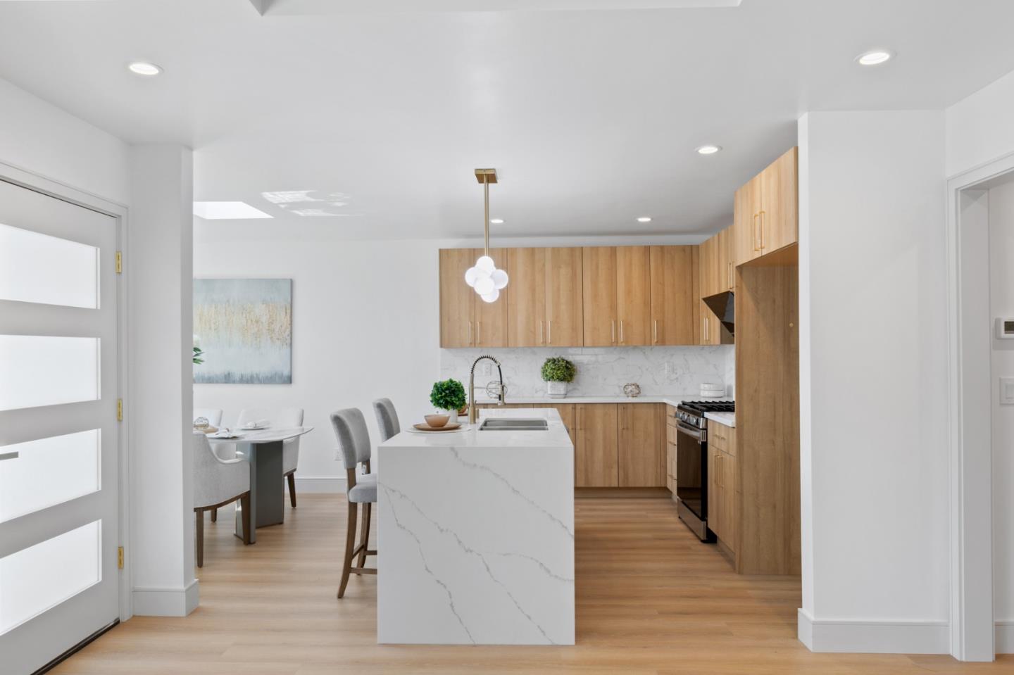 1381 Hampton Drive Sunnyvale, CA 94087 - Photo 8 of 28 a kitchen with a table and chairs in it