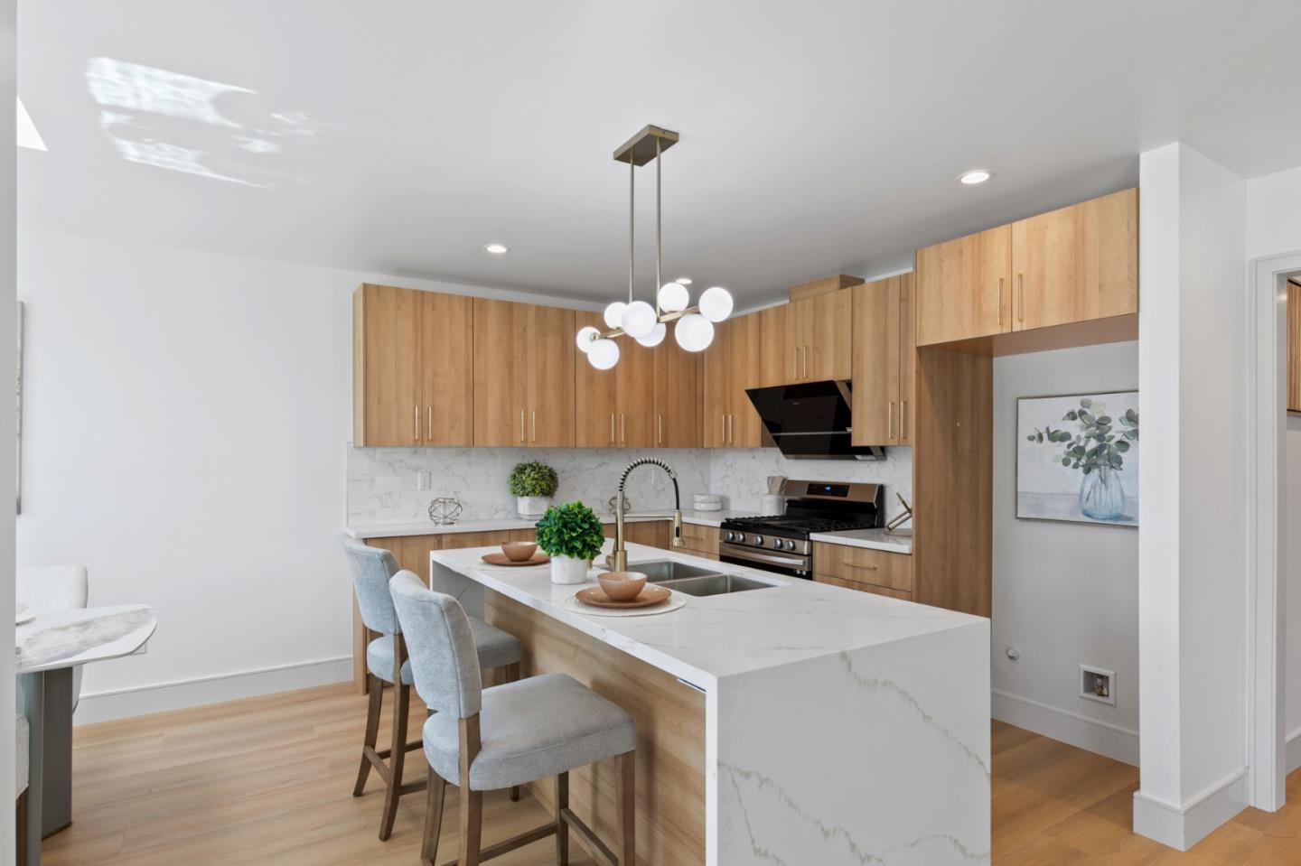 1381 Hampton Drive Sunnyvale, CA 94087 - Photo 9 of 28 a kitchen that has a table and chairs in it