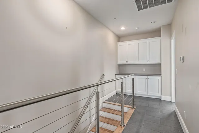 a view of entryway with kitchen