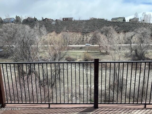 705 Nogal Road, Unit D6 Eagle, CO 81631 - Photo 4 of 15 a balcony with wooden floor