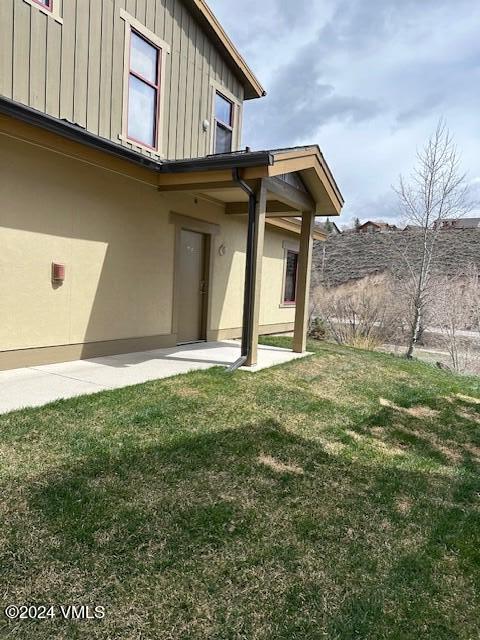 705 Nogal Road, Unit D6 Eagle, CO 81631 - Photo 5 of 15 a front view of a house with garden
