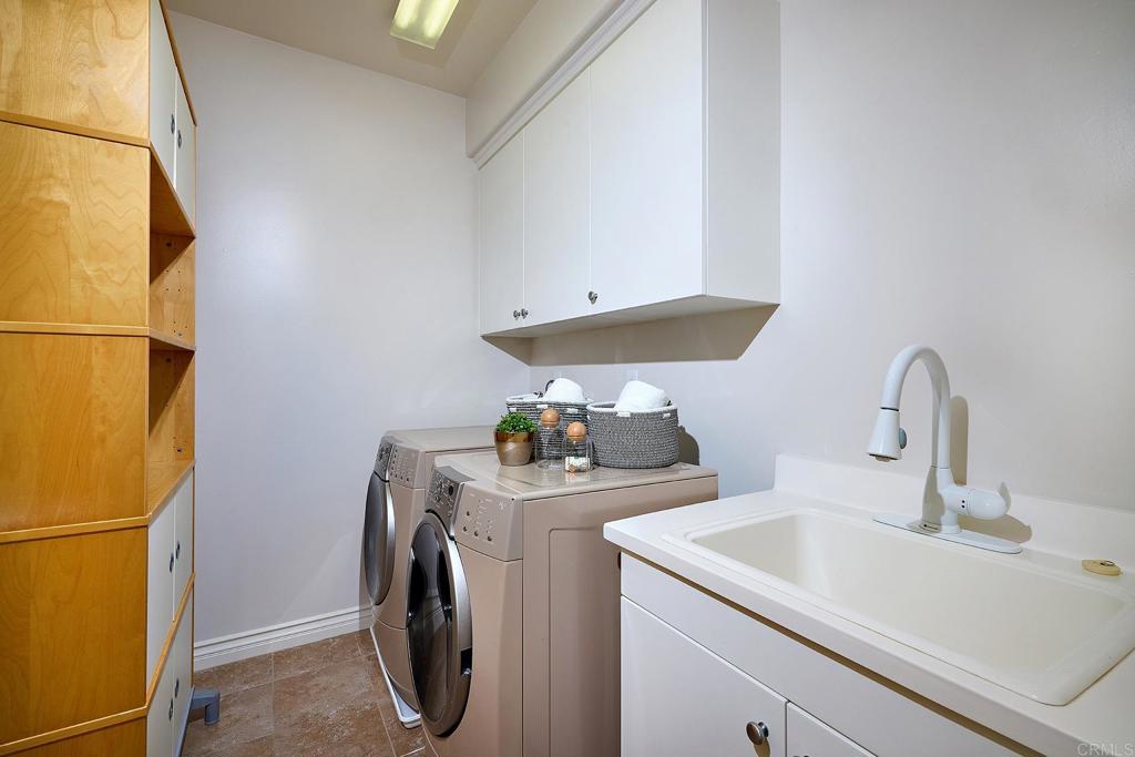 6626 Halite Place Carlsbad, CA 92009 - Photo 34 of 55 a utility room with dryer and washer