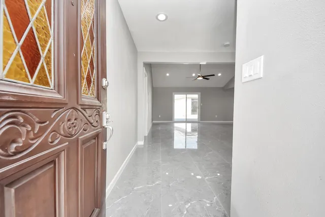 a kitchen with a stove and a sink