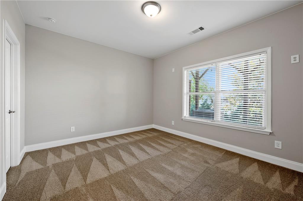 2140 Coventry Drive Brookhaven, GA 30319 - Photo 20 of 29 a view of an empty room with a window