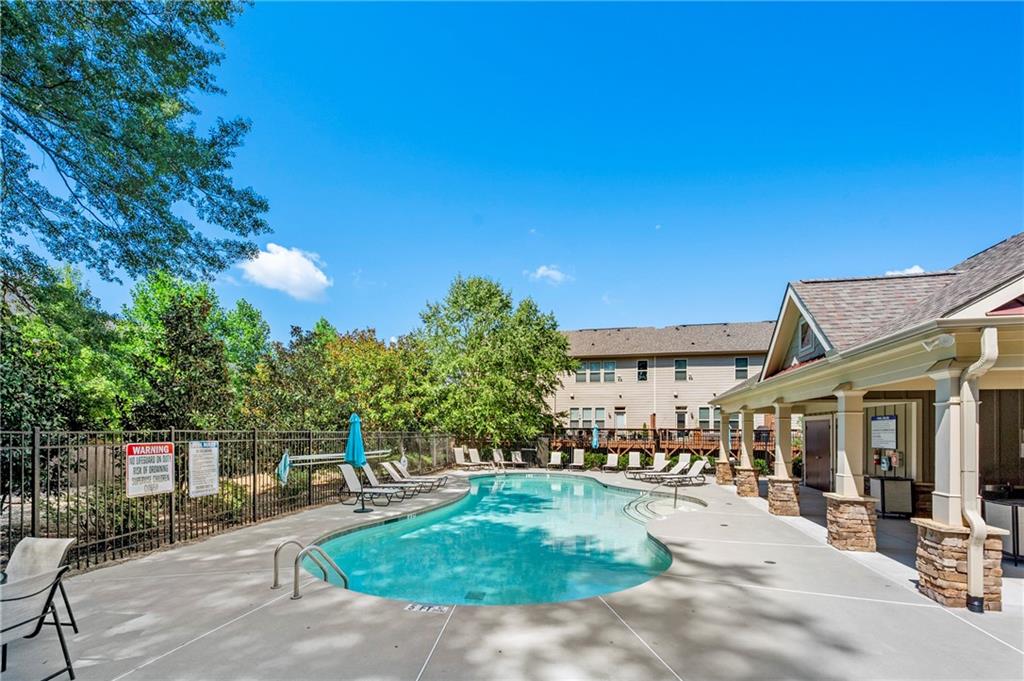 2140 Coventry Drive Brookhaven, GA 30319 - Photo 29 of 29 a swimming pool with outdoor seating and yard