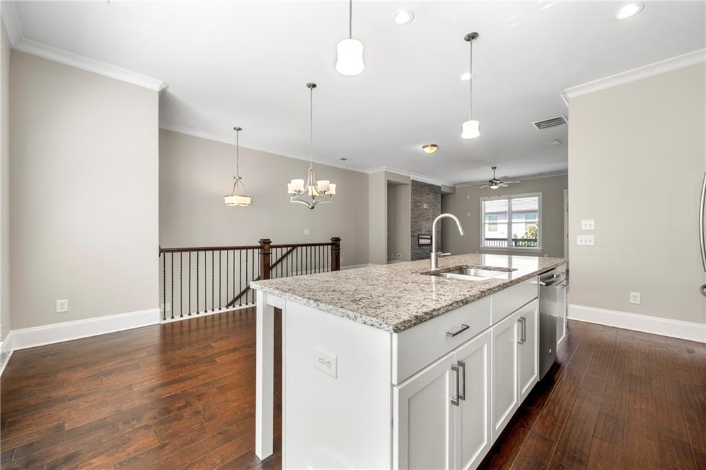 2140 Coventry Drive Brookhaven, GA 30319 - Photo 5 of 29 a kitchen with a sink and a wooden floor