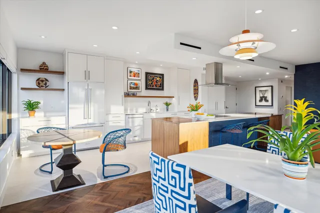 a kitchen with a sink a counter top space and appliances