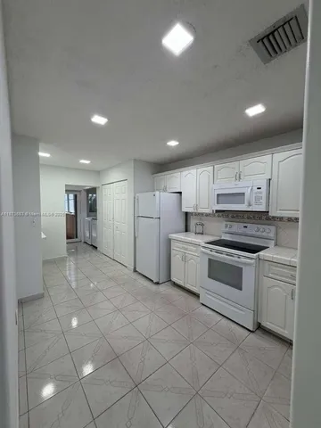 an empty room with a workbench