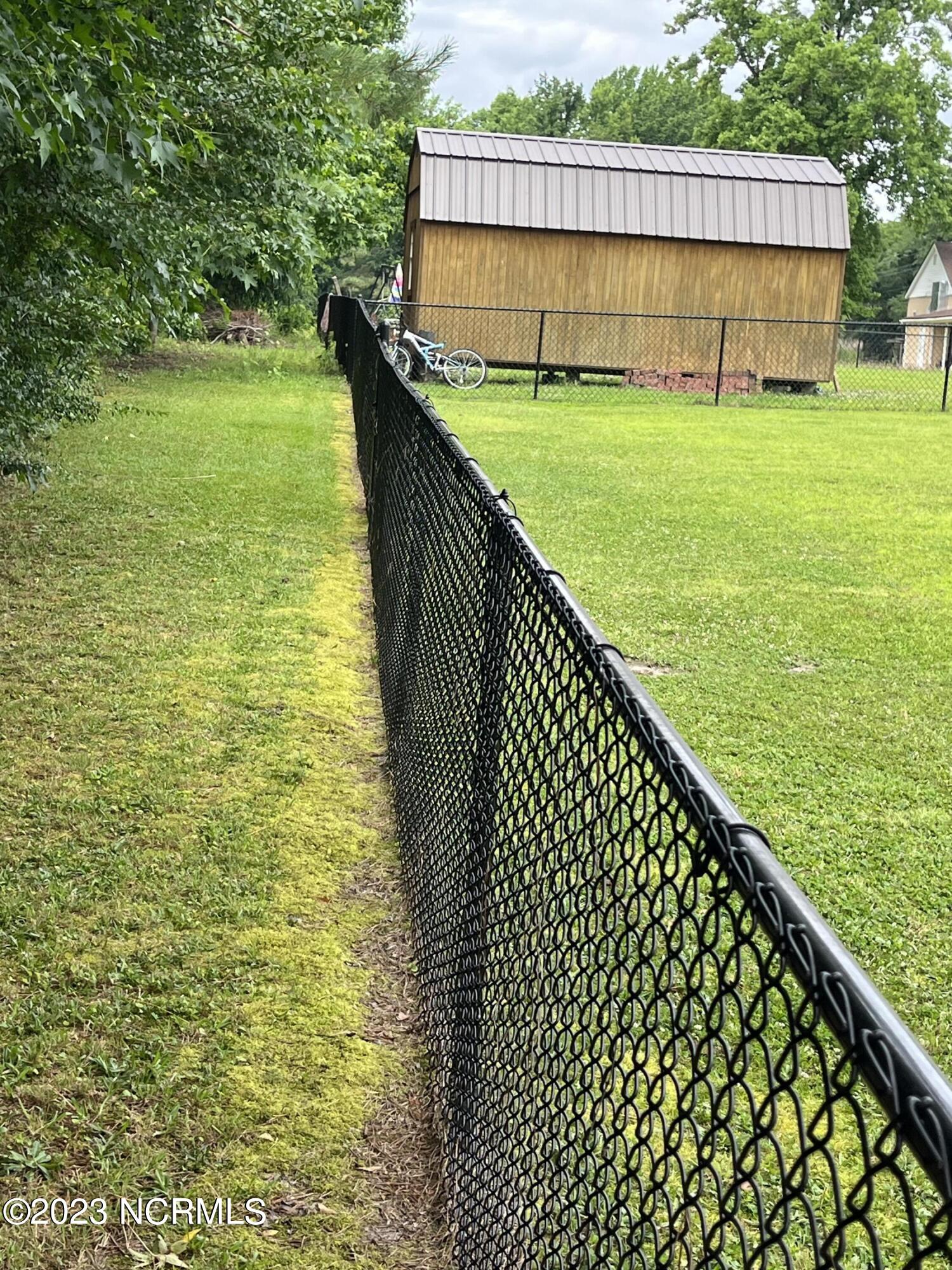 189 Cherry Run Road Washington, NC 27889 - Photo 32 of 36 Fence at rear of property