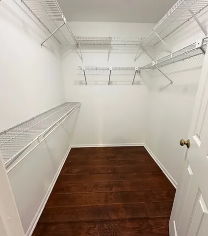 a view of a room with racks on the wall