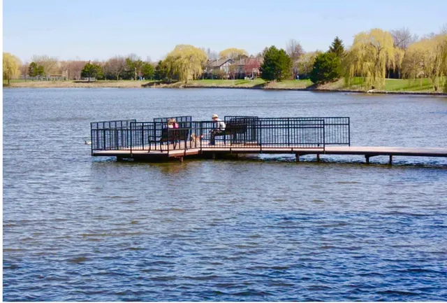 a view of swimming pool with outdoor space and seating