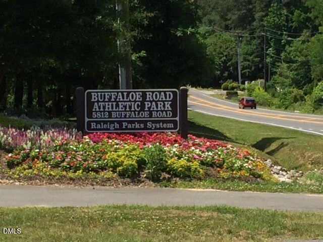 6016 River Lake Circle Raleigh, NC 27604 - Photo 20 of 20 a view of a street with flower garden