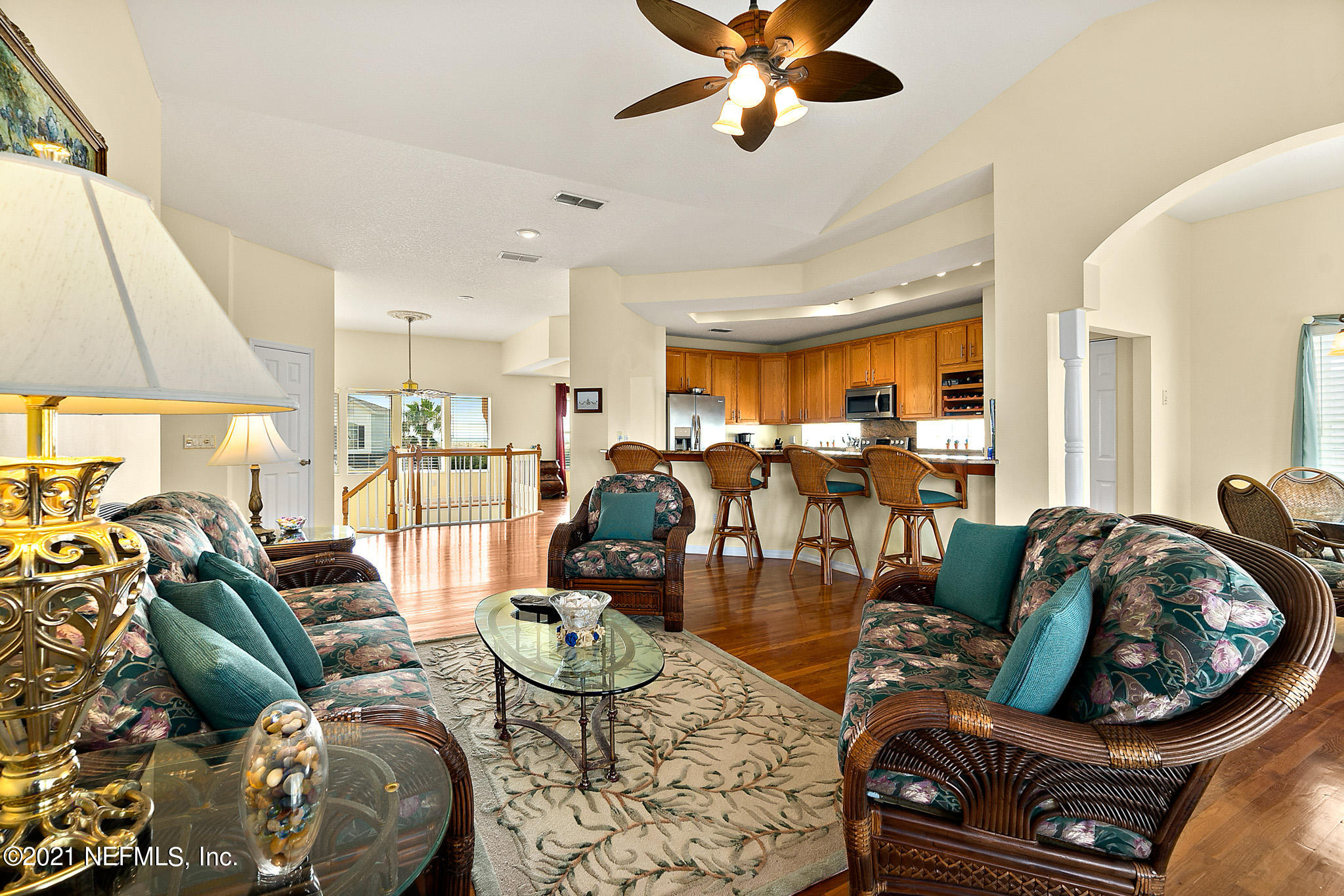 9269 July Lane St. Augustine, FL 32080 - Photo 28 of 105 a living room with furniture and kitchen view