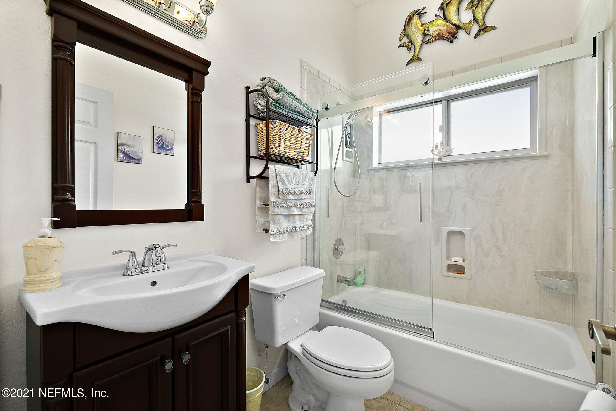 9269 July Lane St. Augustine, FL 32080 - Photo 48 of 105 a bathroom with a sink a toilet and shower