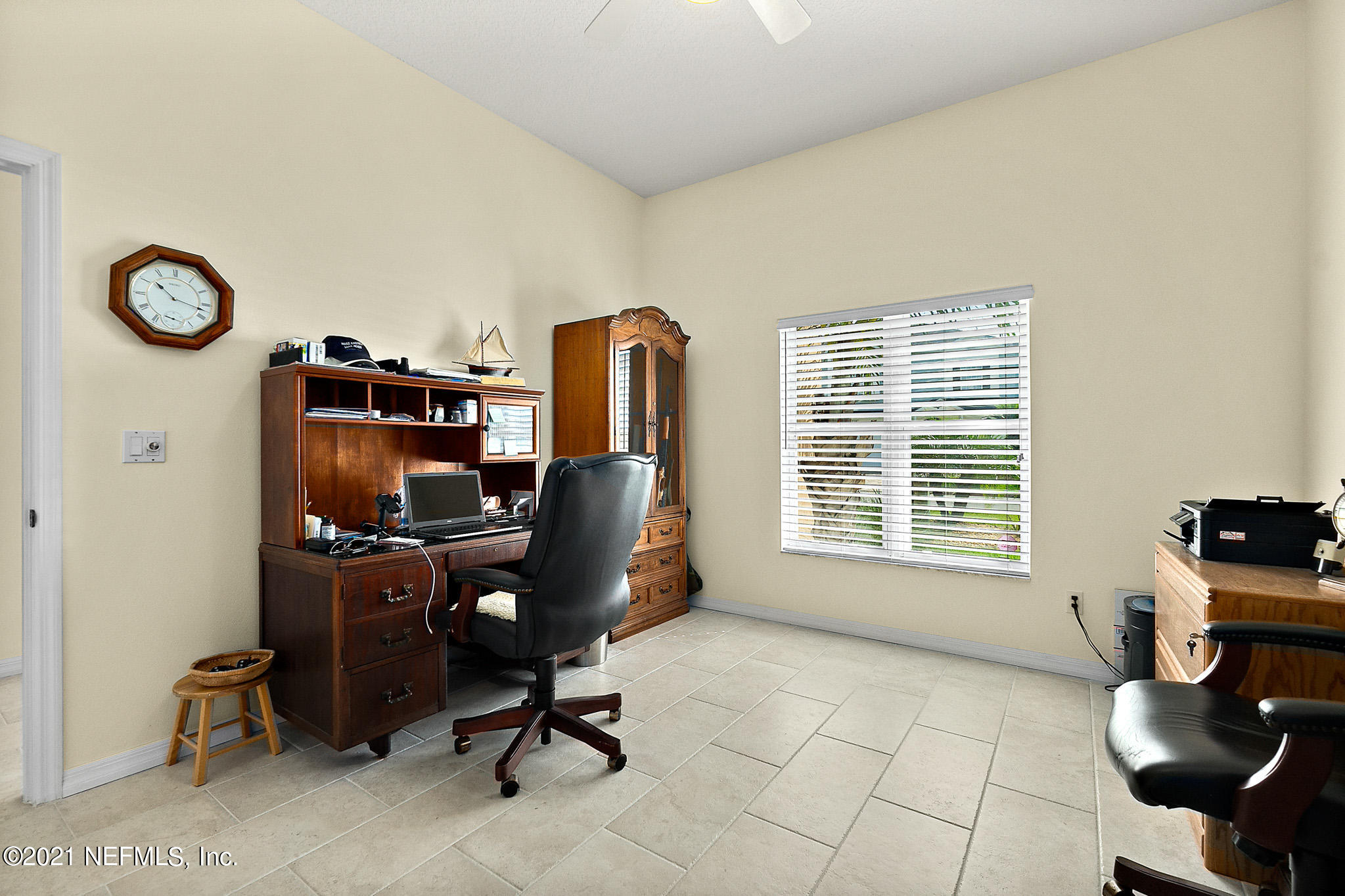9269 July Lane St. Augustine, FL 32080 - Photo 5 of 105 a view of a workspace with furniture and a window