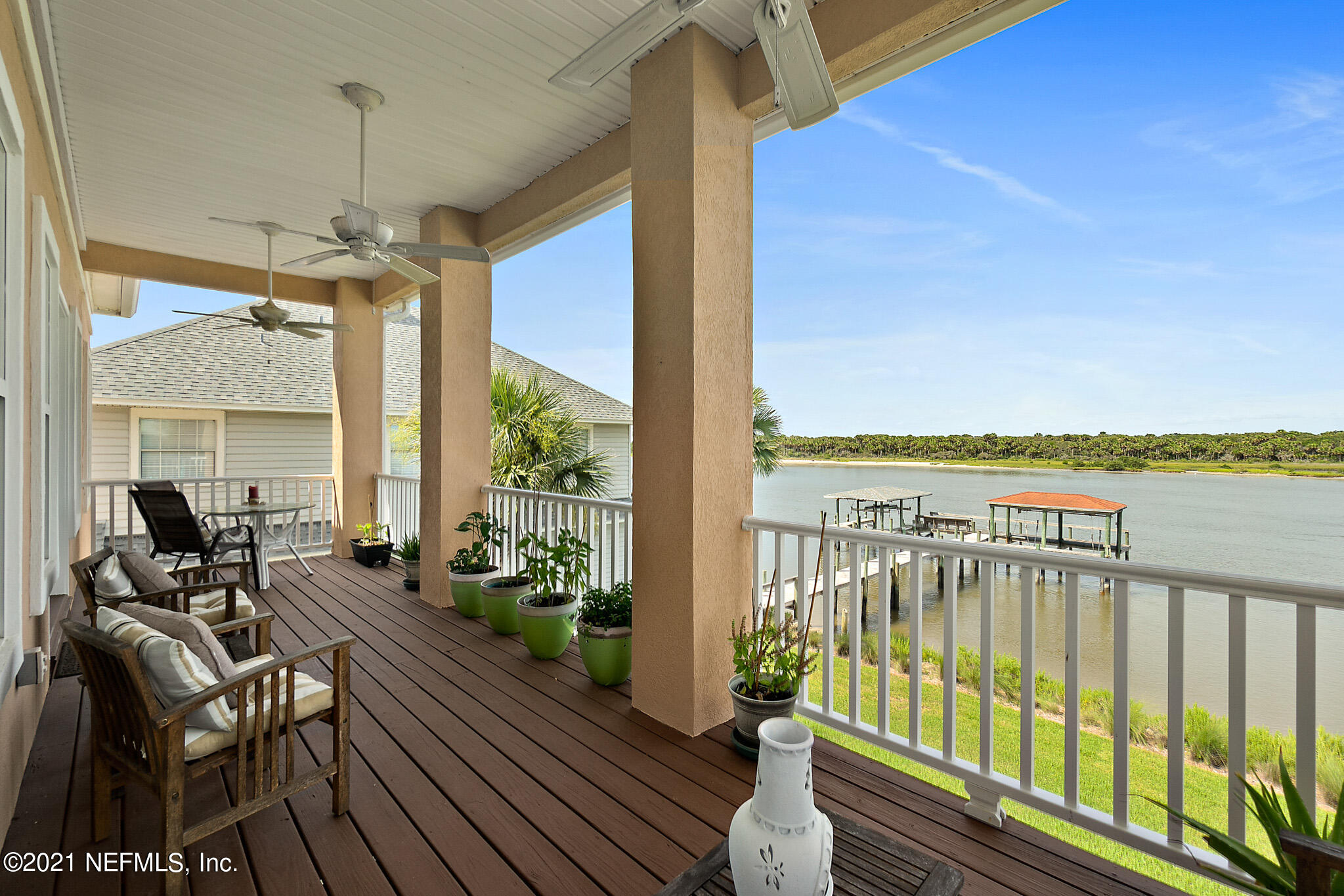 9269 July Lane St. Augustine, FL 32080 - Photo 54 of 105 a view of a balcony with chairs