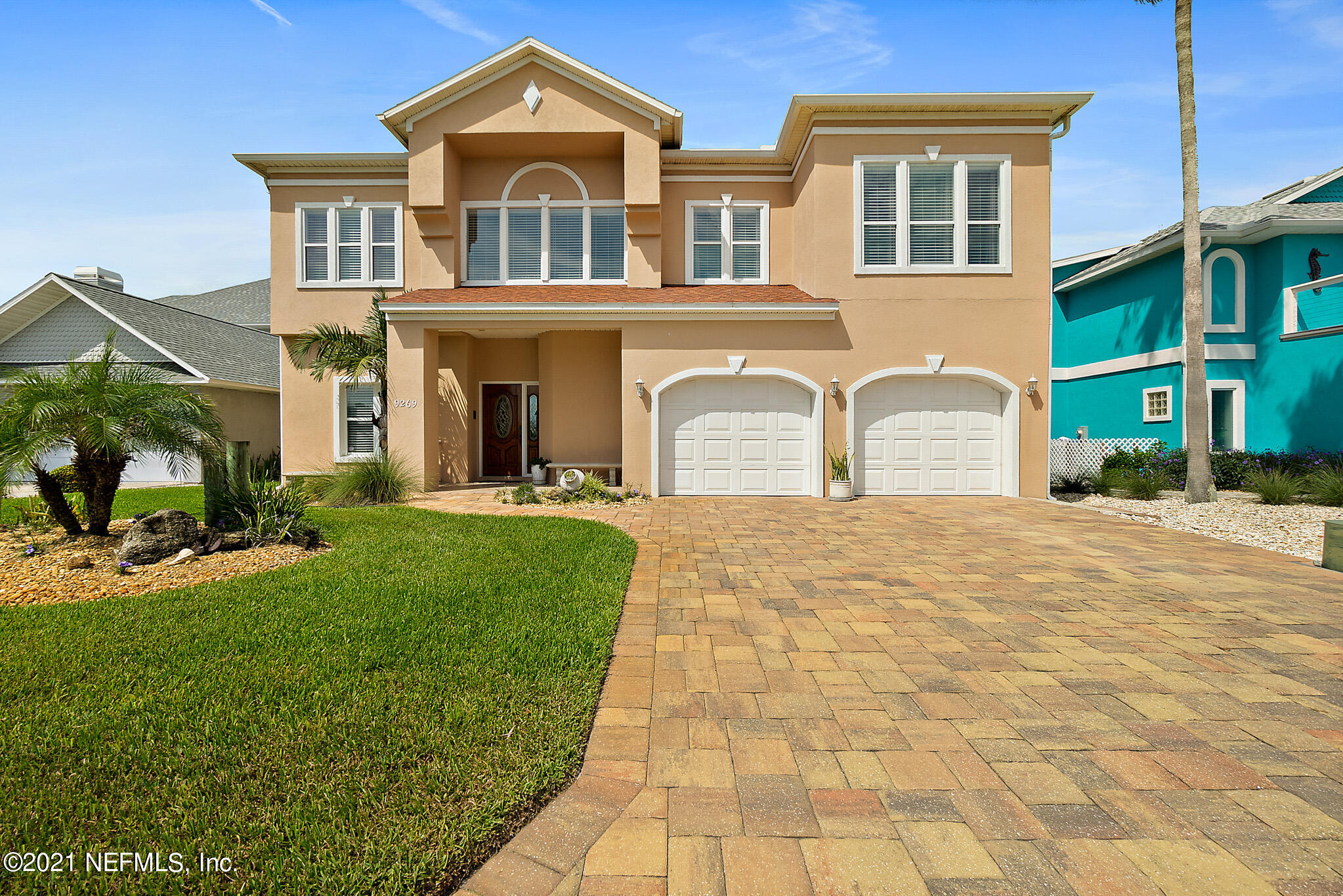 9269 July Lane St. Augustine, FL 32080 - Photo 71 of 105 a front view of a house with a yard