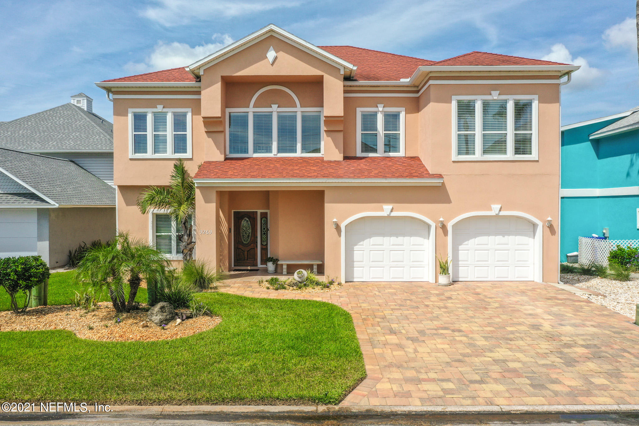 9269 July Lane St. Augustine, FL 32080 - Photo 75 of 105 a front view of a house with a yard