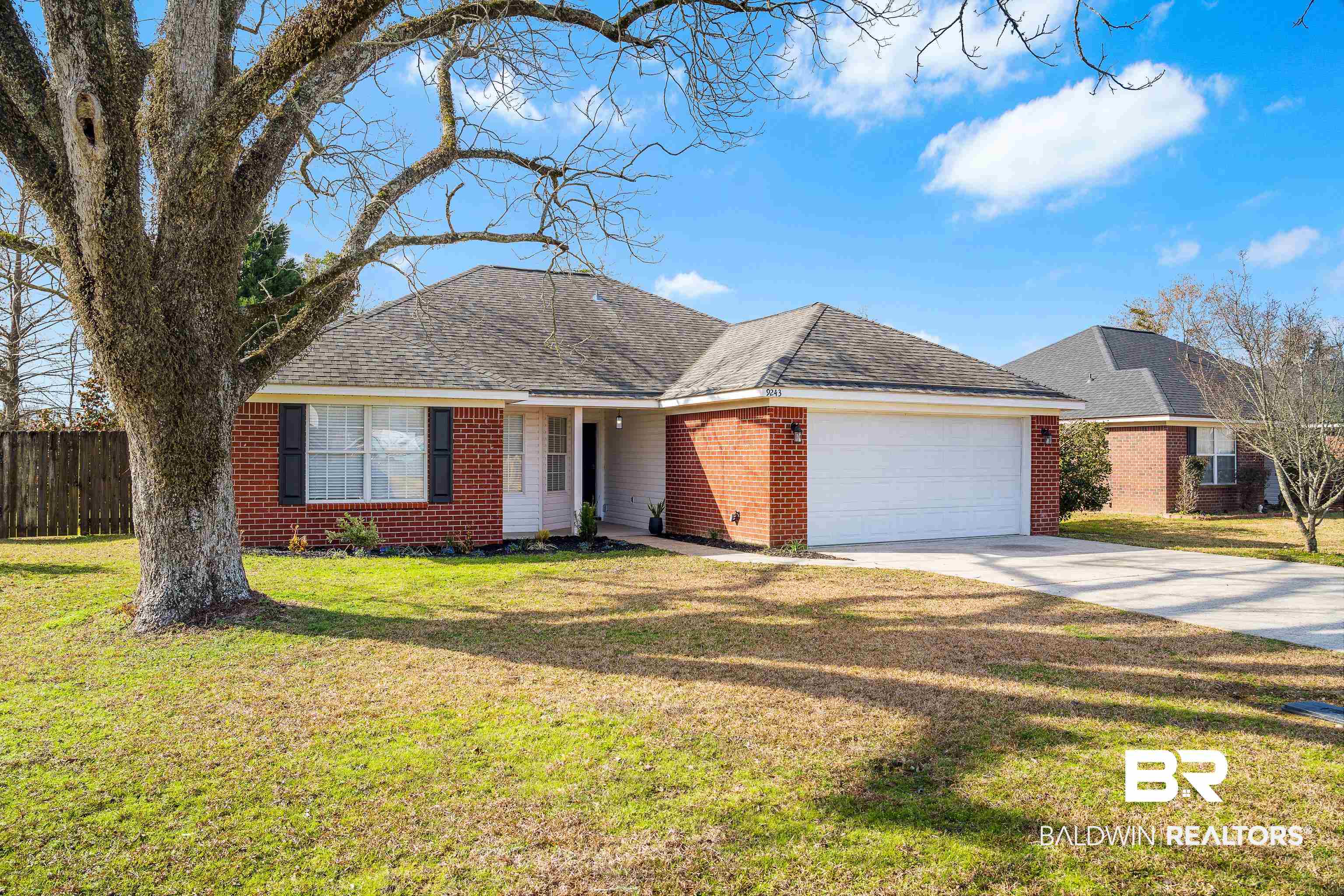 9243 Brookshire Loop Daphne, AL 36526 - Photo 18 of 26 Ranch-style house featuring a garage and a front yard