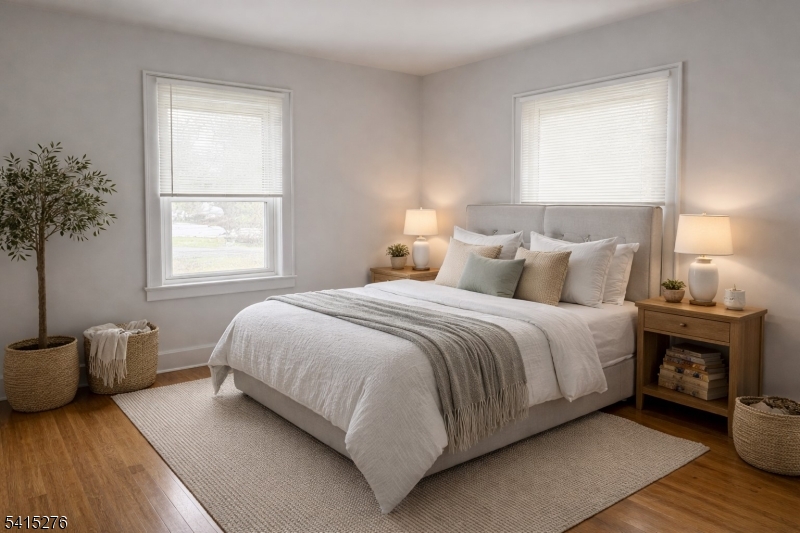 59 Walnut Street, Unit 1 Montclair, NJ 07042 - Photo 4 of 8 a bedroom with a bed and a window