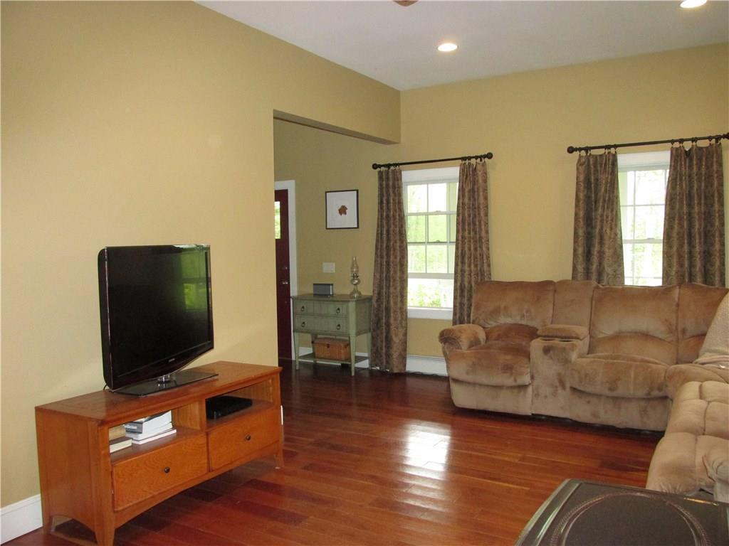 268 Whitcomb Road Waldo, ME 04915 - Photo 14 of 35 The Cherry flooring throughout the...